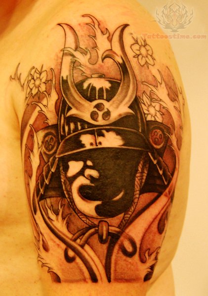Black Ink Samurai Head Tattoo On Man Left Half Sleeve By Olive Green