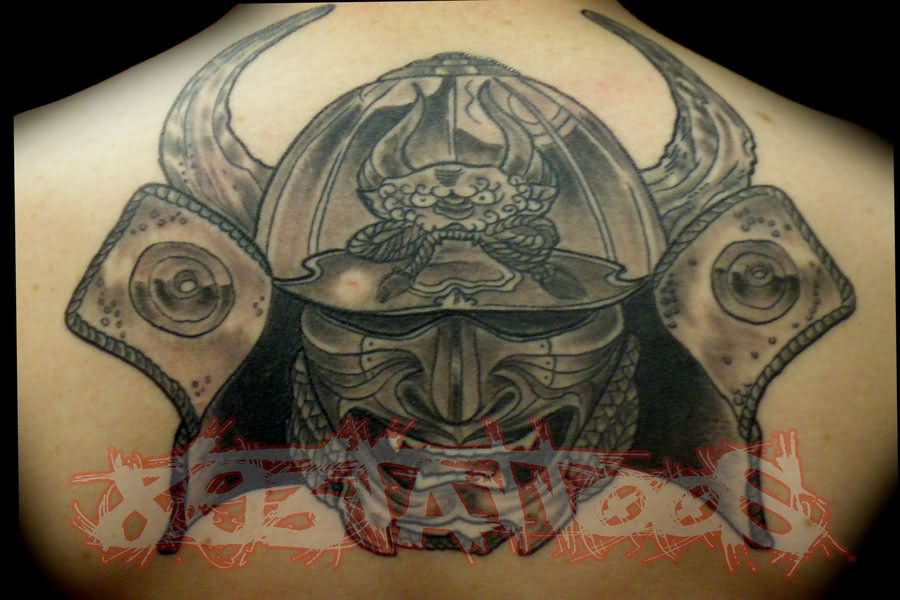 Black Ink Samurai HeadTattoo On Man Upper Back By Gil Tattoos