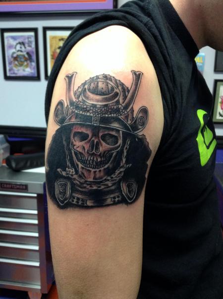 Black Ink Samurai Skull Tattoo On Man Right Shoulder
