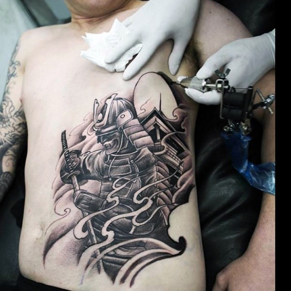 Black Ink Samurai Tattoo On Man Stomach