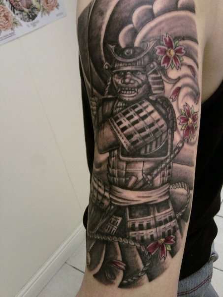 Black Ink Samurai Warrior Tattoo On Left Half Sleeve