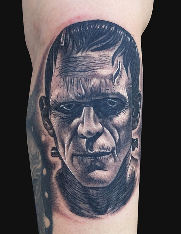 Black Ink Scary Frankenstein Head Tattoo On Half Sleeve By Daniel Chashoudian