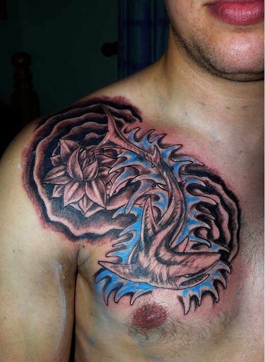 Black Ink Shark With Lotus Flower Tattoo On Man Right Front Shoulder