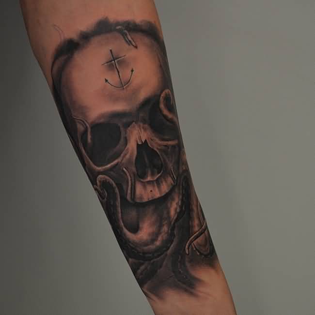 Black Ink Skull With Octopus Tattoo On Left Forearm By Ben Thomas