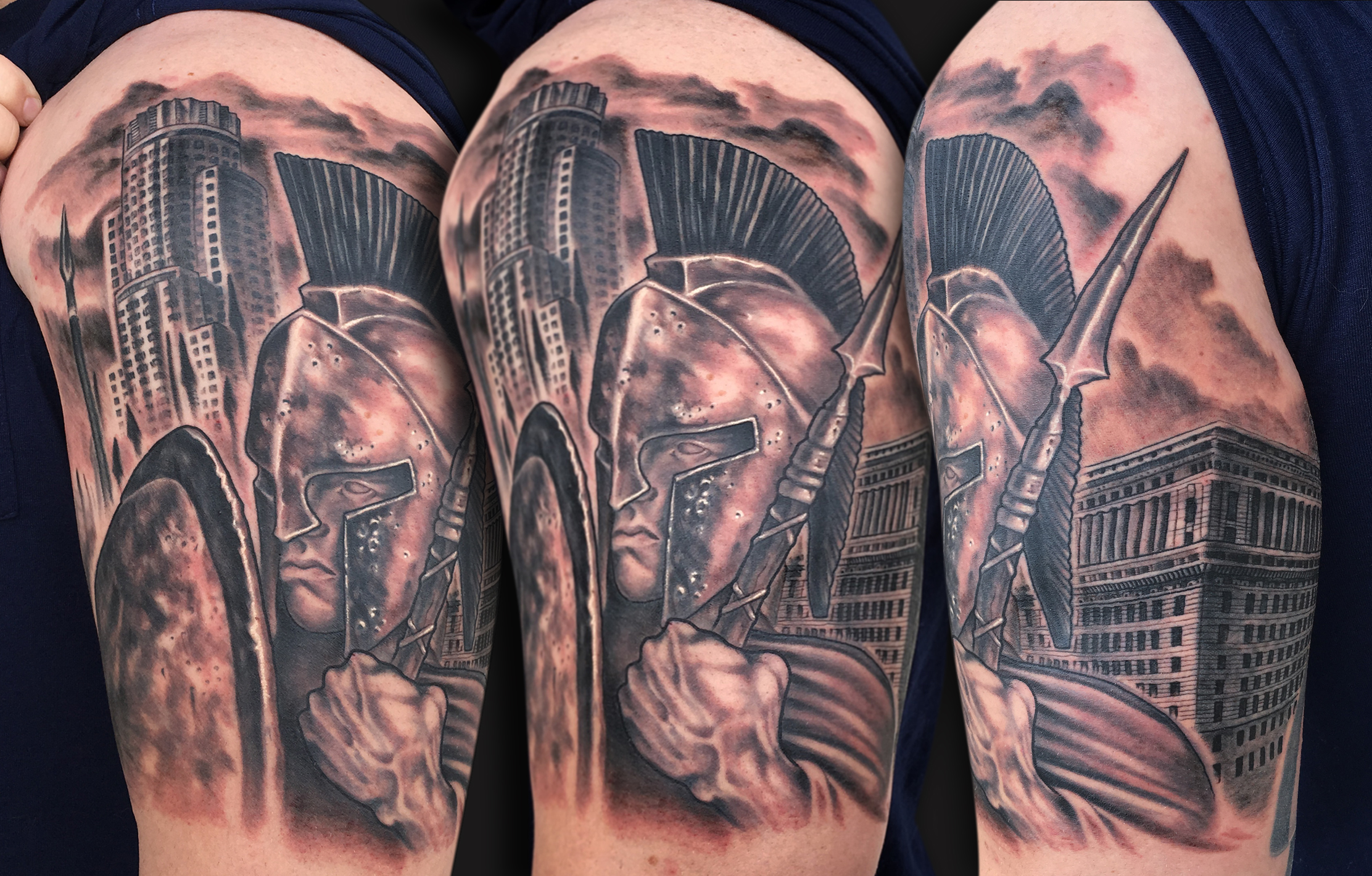 Black Ink Spartan Warrior And LA Buildings Tattoo On Left Half Sleeve By Spencer Caligiuri