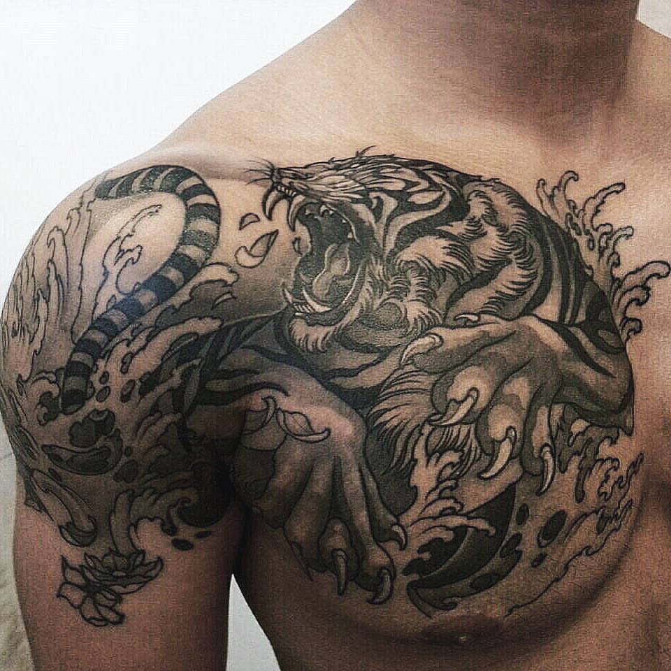 Black Ink Tiger Tattoo On Man Right Shoulder And Chest