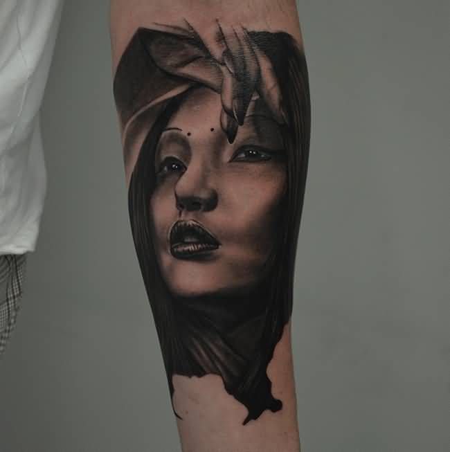 Black Ink Women Face Tattoo On Left Forearm By Ben Thomas