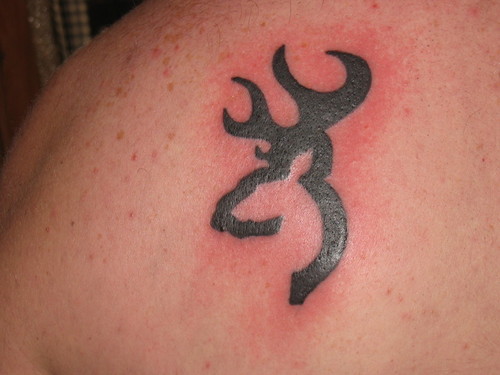 Black Tribal Deer Head Tattoo On Back Shoulder