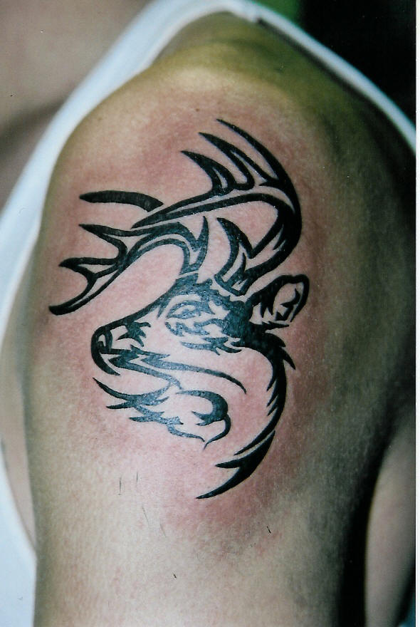 Black Tribal Deer Tattoo On Left Shoulder