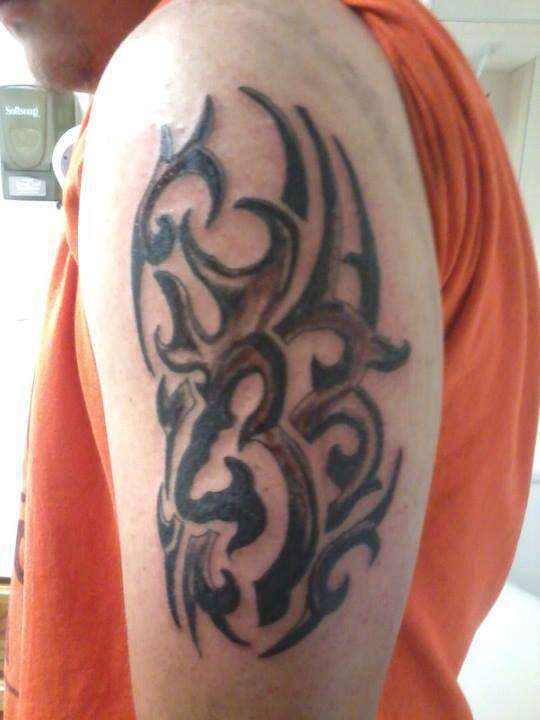 Browning Tribal Deer Tattoo On Left Half Sleeve