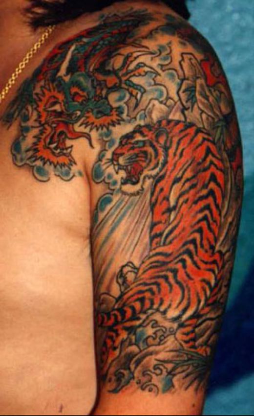 Chinese Tiger Tattoo On Left Shoulder And Half Sleeve