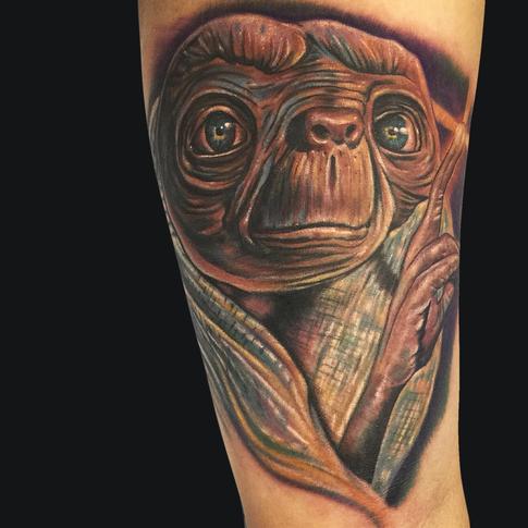 Classic ET Tattoo On Half Sleeve By Mike Devries