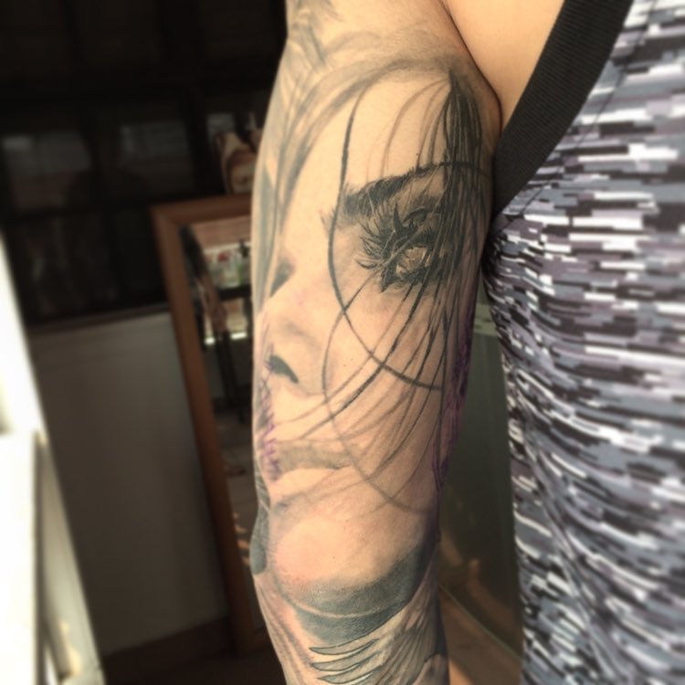 Classic Grey Ink Girl Face Tattoo On Left Half Sleeve