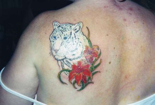 Color Flowers And White Tiger Head Tattoo On Left Back Shoulder