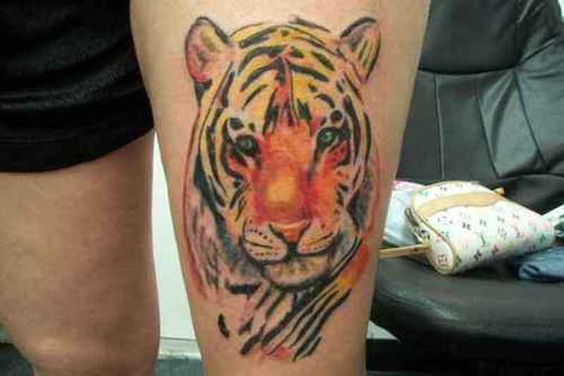 Color Ink Tiger Head Tattoo On Left Thigh