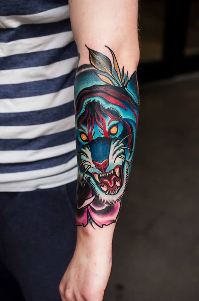 Colorful Blue Tiger Face Tattoo On Arm
