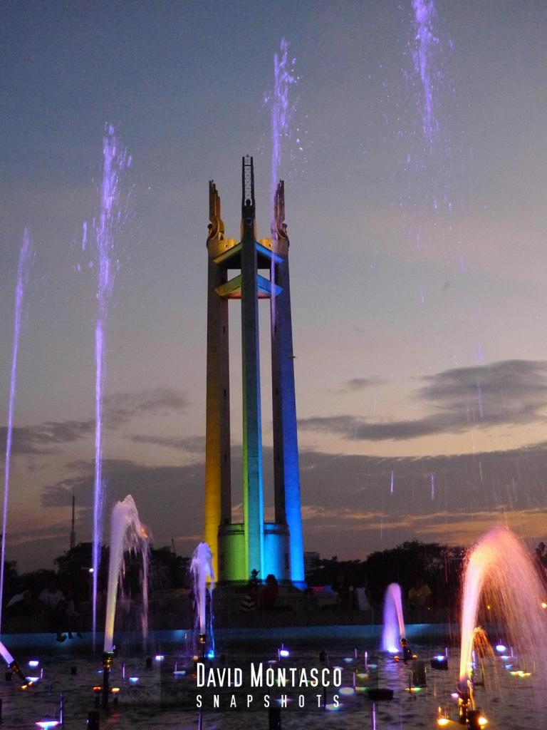 Colorful Lights At The Quezon Memorial Shrine With Fountain