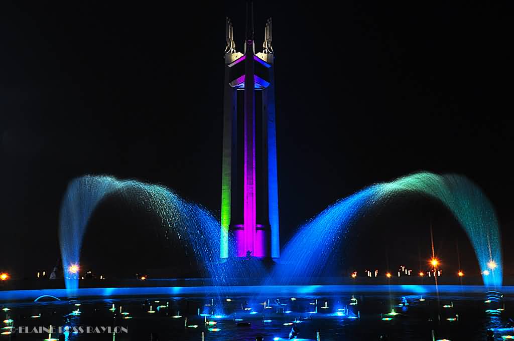 Colorful View Of Dancing Fountain And Quezon Memorial Shrine At Night