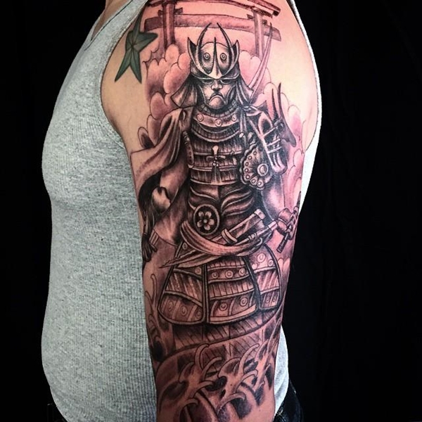 Cool Black Ink Samurai Warrior Tattoo On Left Half Sleeve