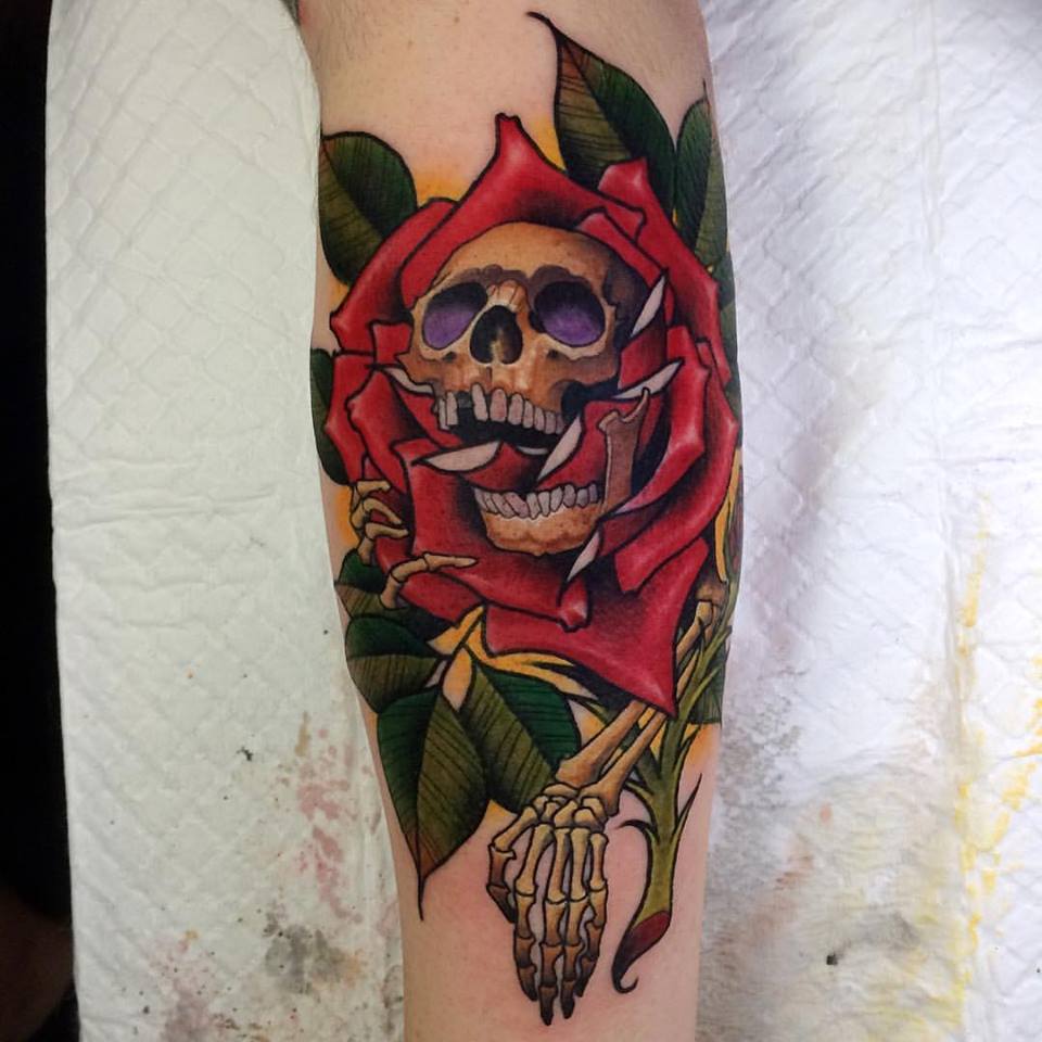 Cool Skull In Red Rose Tattoo On Sleeve