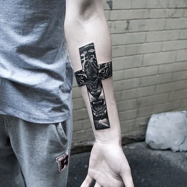 Cross And Tiger Face Tattoo On Forearm