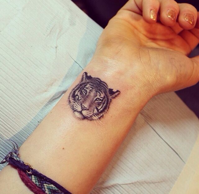 Cute Tiger Head Tattoo On Right Wrist