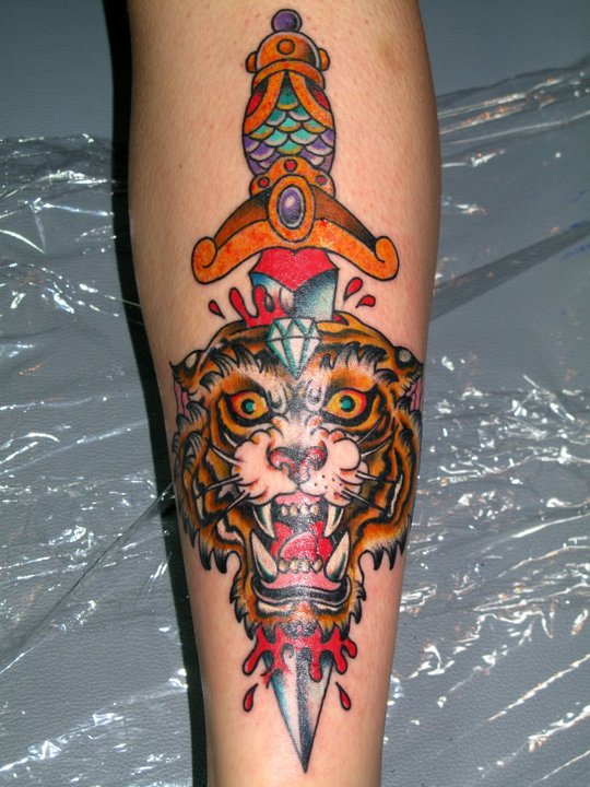 Dagger And Tiger Head Tattoo On Leg