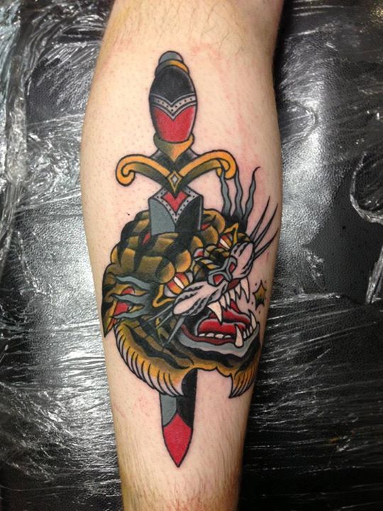Dagger And Tiger Tattoo On Leg