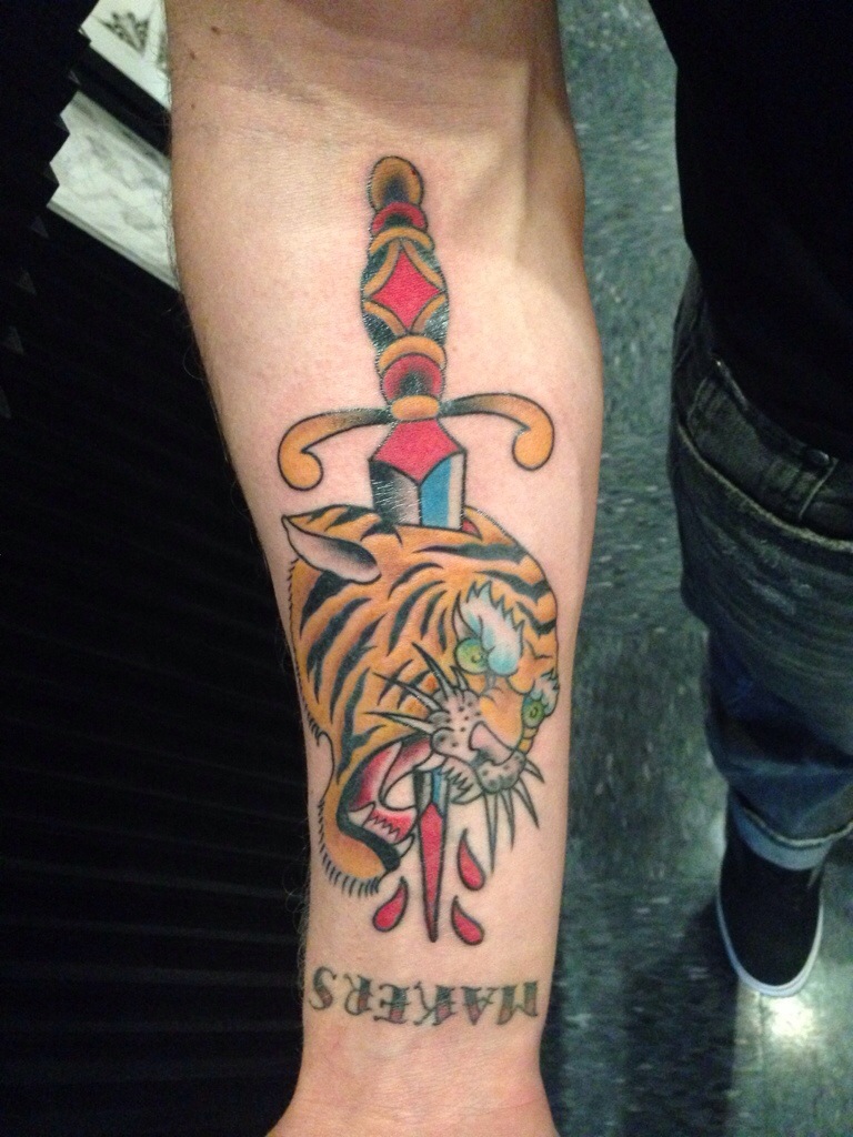 Dagger And Tiger Tattoo On Man Right Forearm