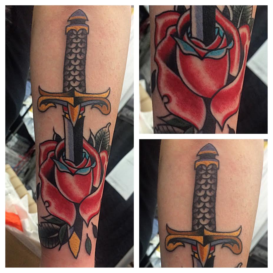 Dagger In Rose Tattoo On Forearm