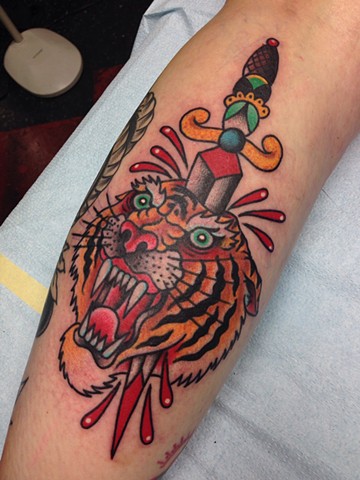 Dagger In Tiger Tattoo On Leg