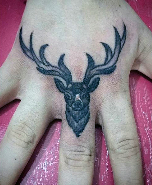 Deer Antler Knuckle Tattoo On Finger