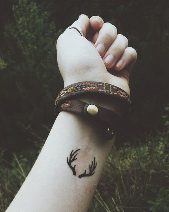Deer Antler Tattoo On Girl Left Wrist
