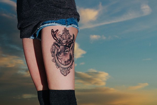 Deer Head In Mirror Frame Tattoo On Side Thigh