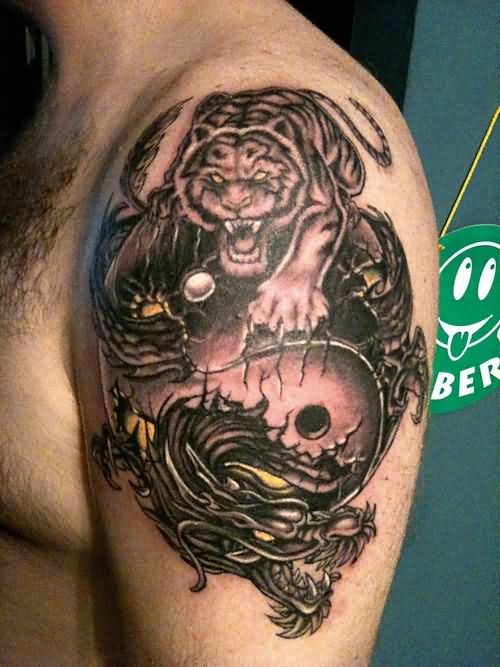 Dragon And Tiger Tattoo On Man Left Shoulder