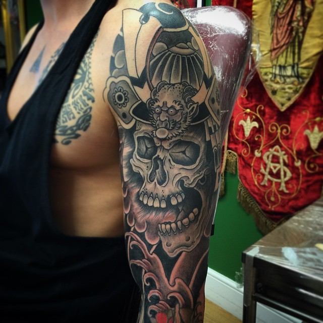 Fantastic Samurai Skull Tattoo On Left Half Sleeve