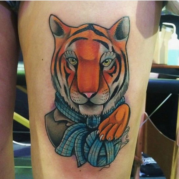 Female Tiger With Yarn Head Tattoo On Thigh