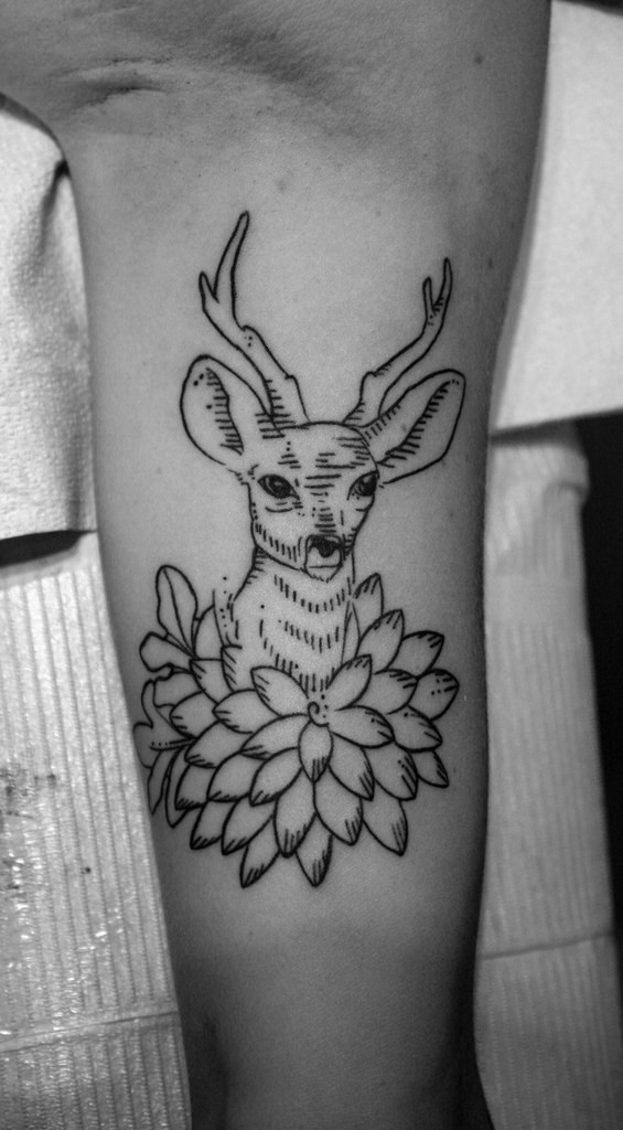 Flower And Traditional Deer Tattoo On Arm