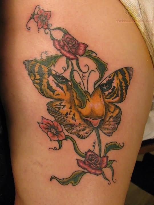 Flowers And And Tiger Face In Butterfly Tattoo On Thigh