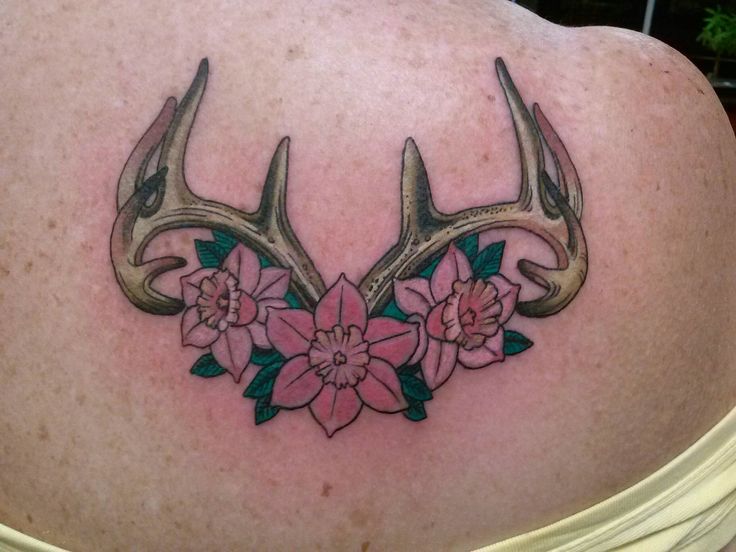Flowers And Deer Antler Tattoo On Back Shoulder