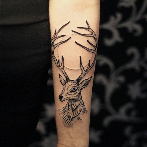 Girl Showing Her Geometric Deer Tattoo