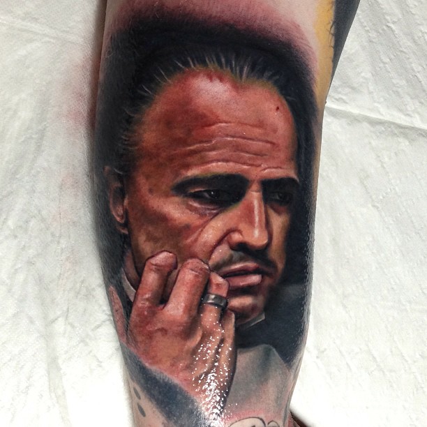 Godfather Portrait Tattoo On Right Half Sleeve By Mick Squires