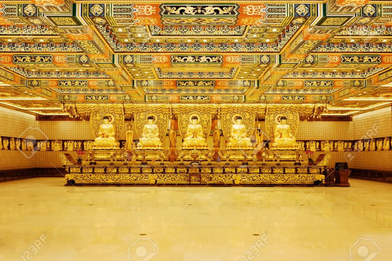 Golden Buddha Statues In Interior Of Po Lin Monastery