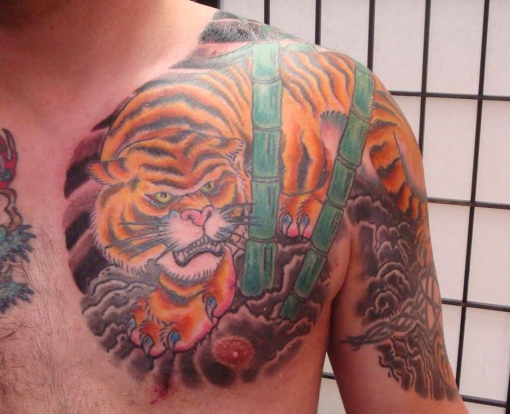 Green Bamboo Trees And Tiger Chest Tattoo