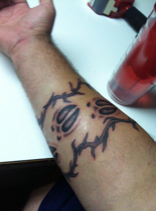 Grey Deer Track Tattoo On Right Forearm