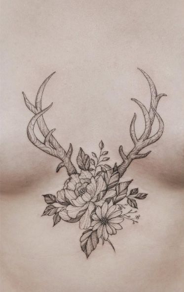 Grey Flowers And Deer Antler Tattoo On Chest