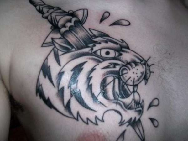 Grey Ink Dagger And Tiger Head Tattoo On Chest