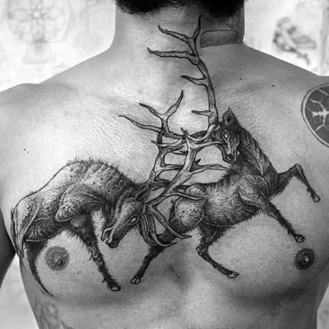 Grey Ink Deer Tattoo On Man Chest