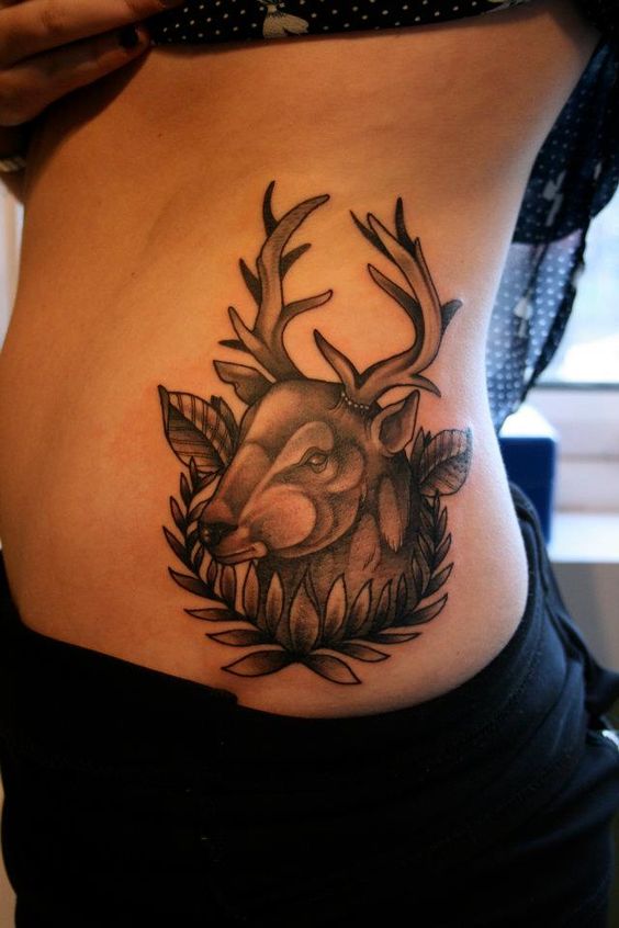 Grey Ink Deer Tattoo On Rib Side