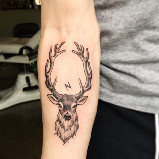 Grey Ink Geometric Deer Tattoo On Forearm